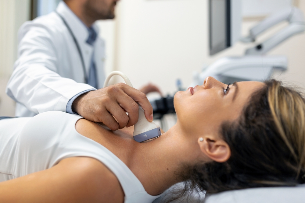 Close,Up,Shot,Of,Young,Woman,Getting,Her,Neck,Examined